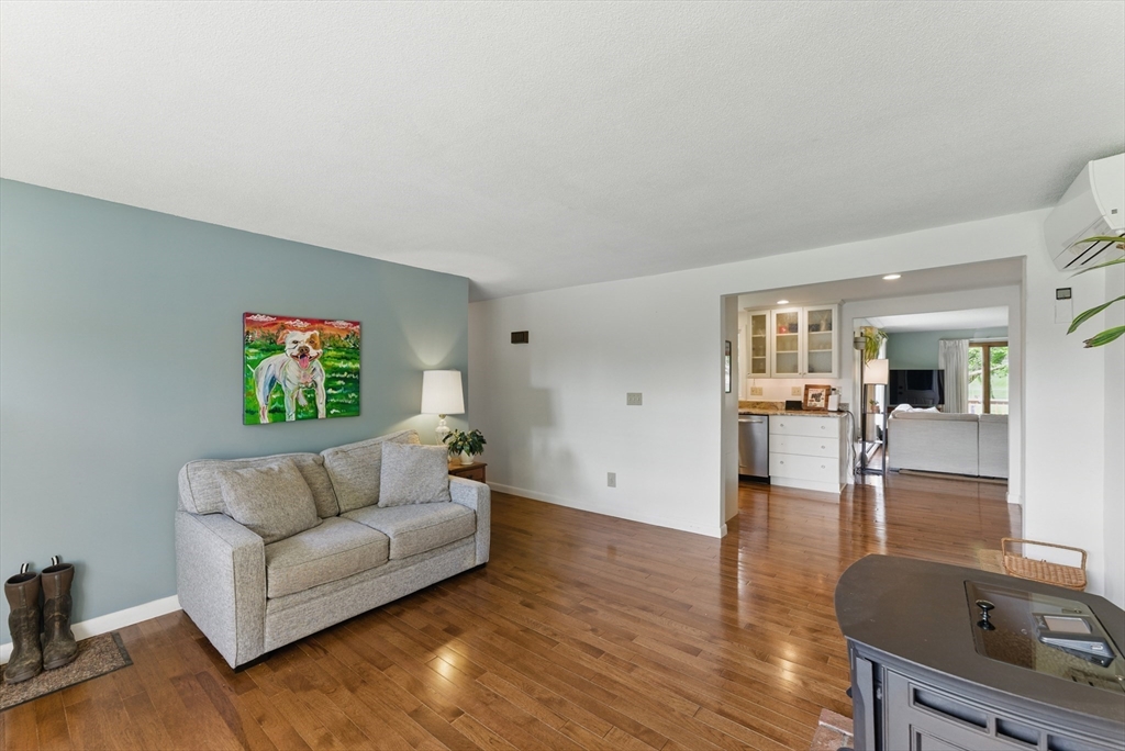 19 Straits Road Hatfield, MA 01038 - Photo 8 of 42 a living room with furniture and a flat screen tv