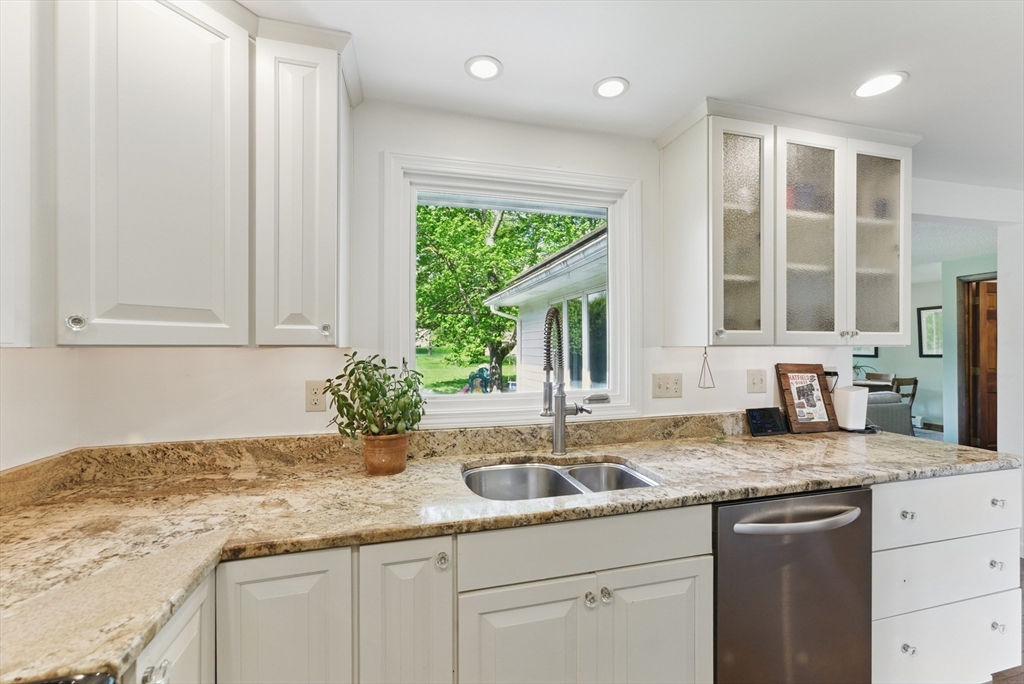 19 Straits Road Hatfield, MA 01038 - Photo 10 of 42 a kitchen with granite countertop a sink stove and cabinets