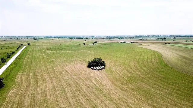 a view of a swimming pool and an outdoor space
