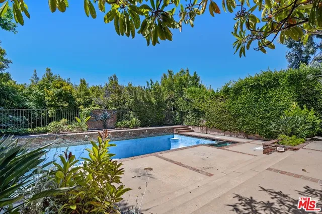 a view of a backyard of a house
