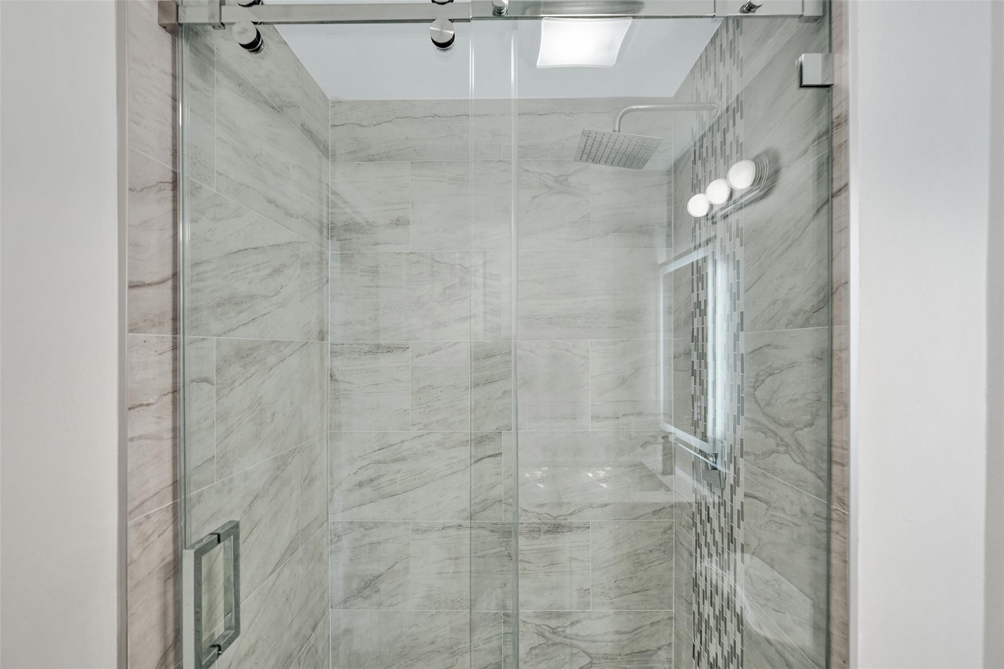 4222 Inverrary Boulevard, Unit 4810 Lauderhill, FL 33319 - Photo 53 of 63 a bathroom with a shower