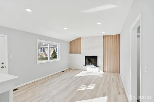 a view of a livingroom with a fireplace