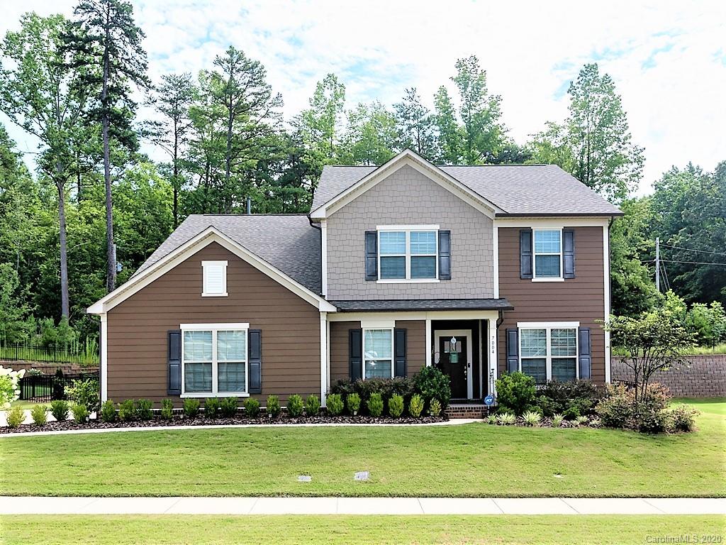 7004 Fallondale Road Waxhaw, NC 28173 - Photo 1 of 37 a front view of a house and a yard