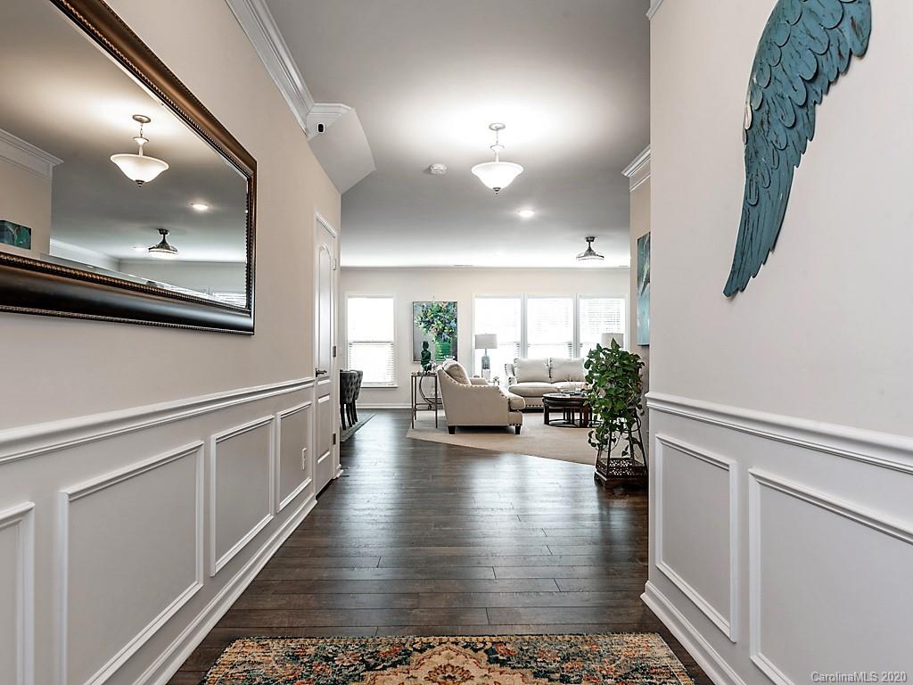 7004 Fallondale Road Waxhaw, NC 28173 - Photo 4 of 37 a lobby with furniture and a potted plant