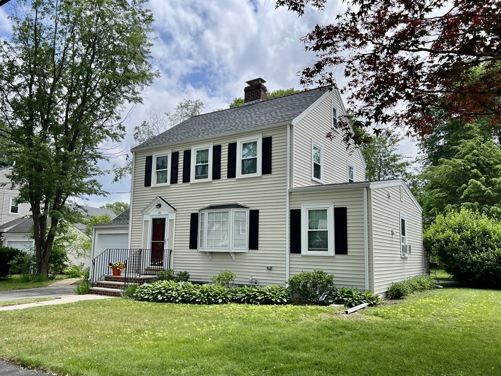 28 Farmington Road Newton, MA 02465 - Photo 1 of 6 a front view of a house with a yard