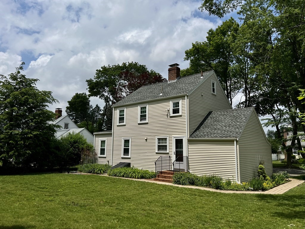 28 Farmington Road Newton, MA 02465 - Photo 2 of 6 a view of a house with a yard