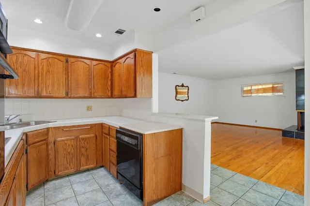 a utility room with cabinets