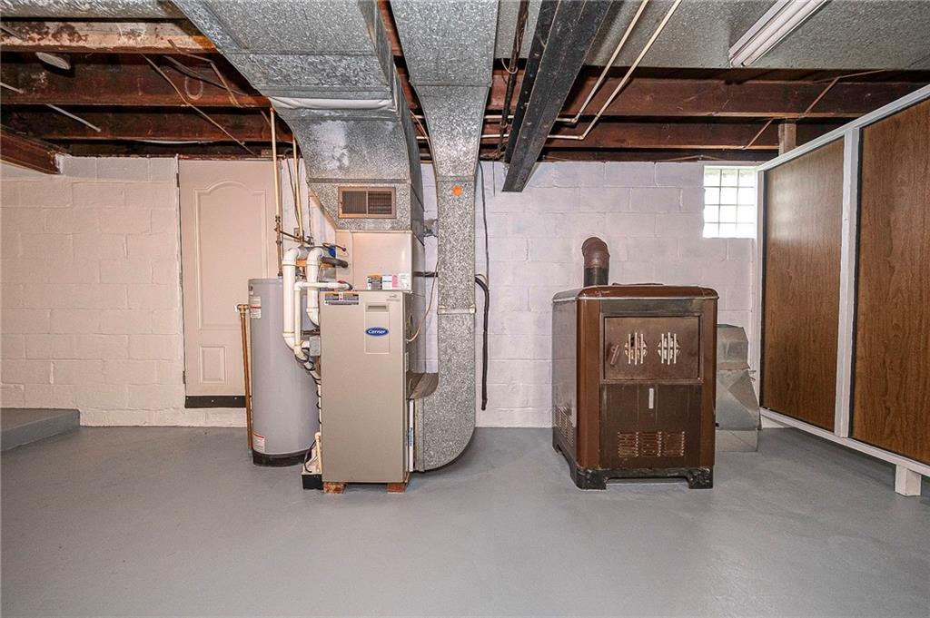531 Laughlin Avenue Pittsburgh, PA 15210 - Photo 22 of 35 a view of storage and utility room with refrigerator