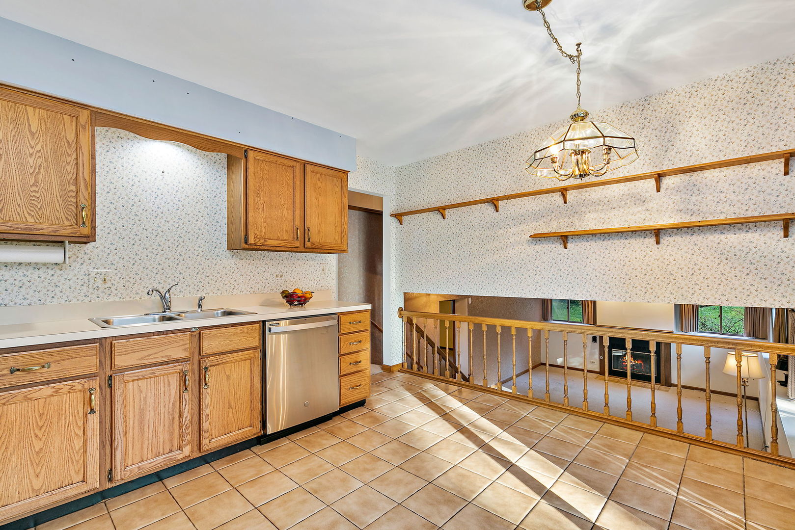 775 Stephen Drive Palatine, IL 60067 - Photo 6 of 19 a open kitchen with stainless steel appliances granite countertop a sink and cabinets