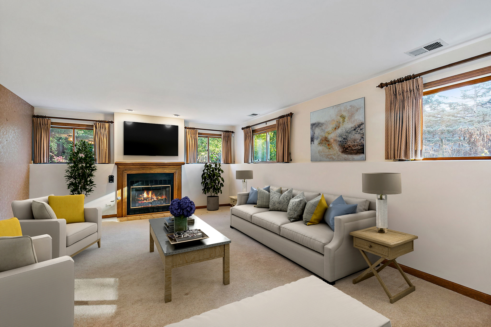 775 Stephen Drive Palatine, IL 60067 - Photo 9 of 19 a living room with furniture a flat screen tv and a fireplace