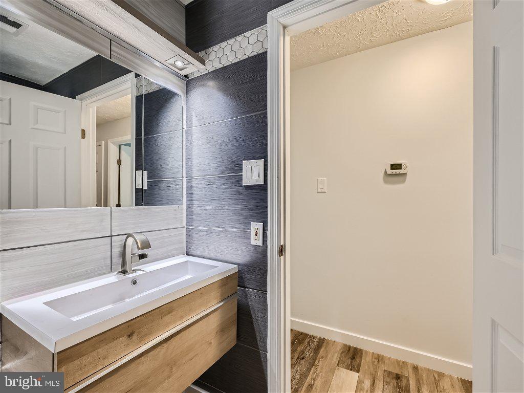 691 Deering Road, Unit 4K Pasadena, MD 21122 - Photo 25 of 29 Second Bathroom