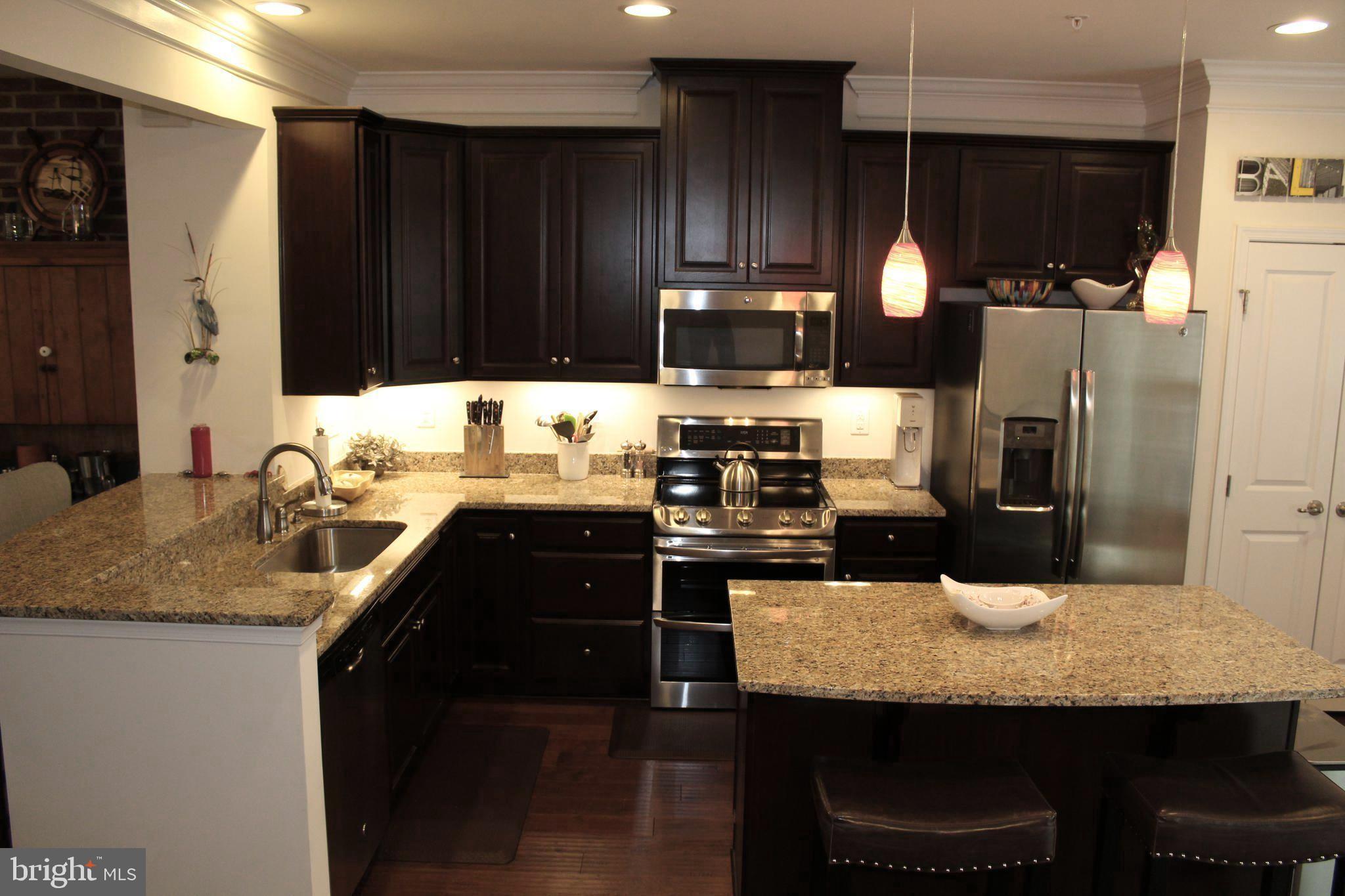 823 South Macon Street Baltimore, MD 21224 - Photo 13 of 30 Breakfast bar & kitchen island