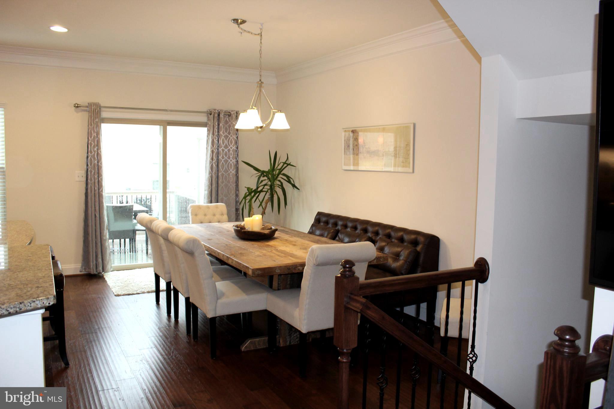 823 South Macon Street Baltimore, MD 21224 - Photo 15 of 30 Dining room/breakfast room w/ slider to deck