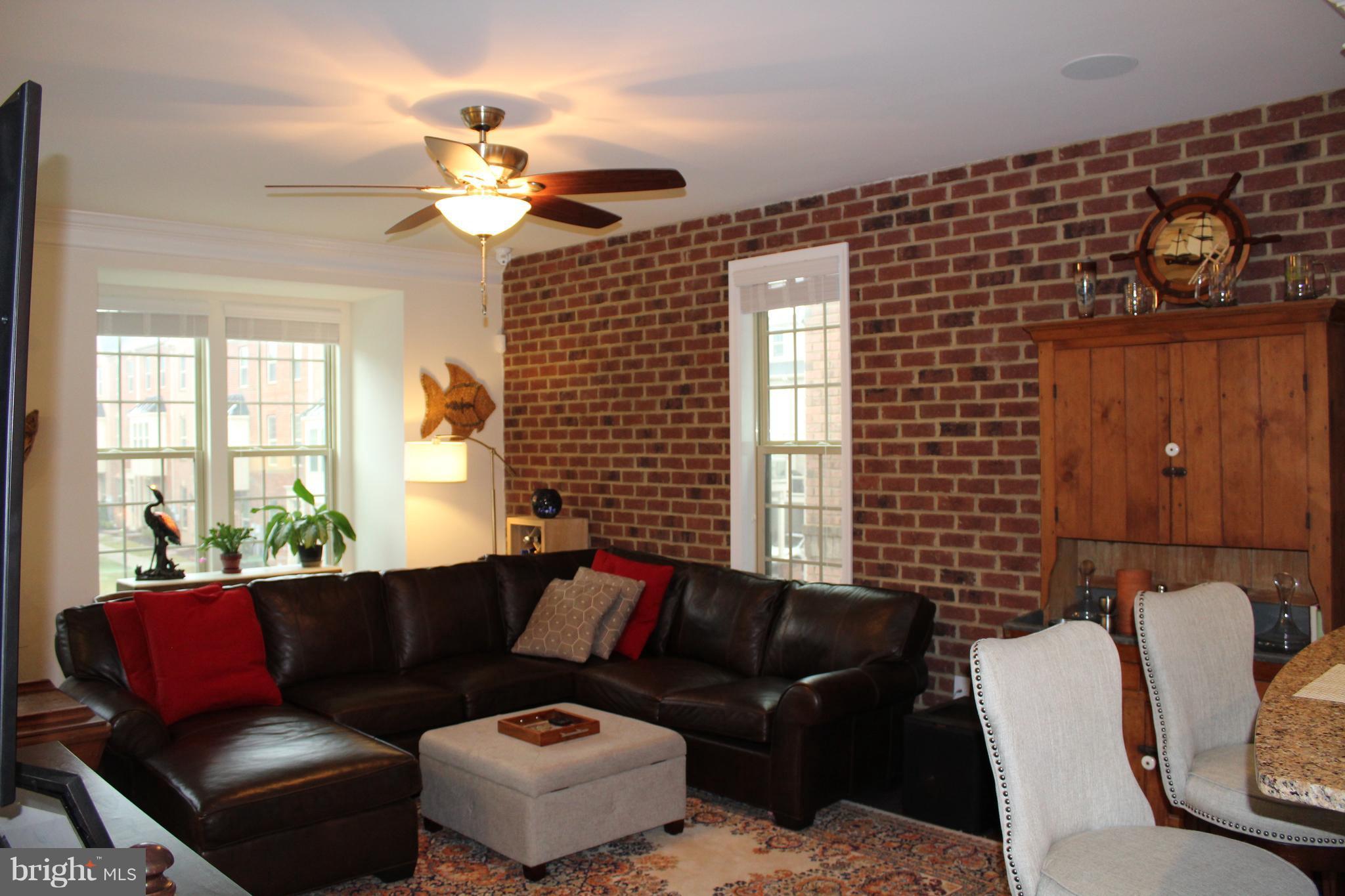823 South Macon Street Baltimore, MD 21224 - Photo 4 of 30 Living Room w/brick wall for THE CANTON CHARM