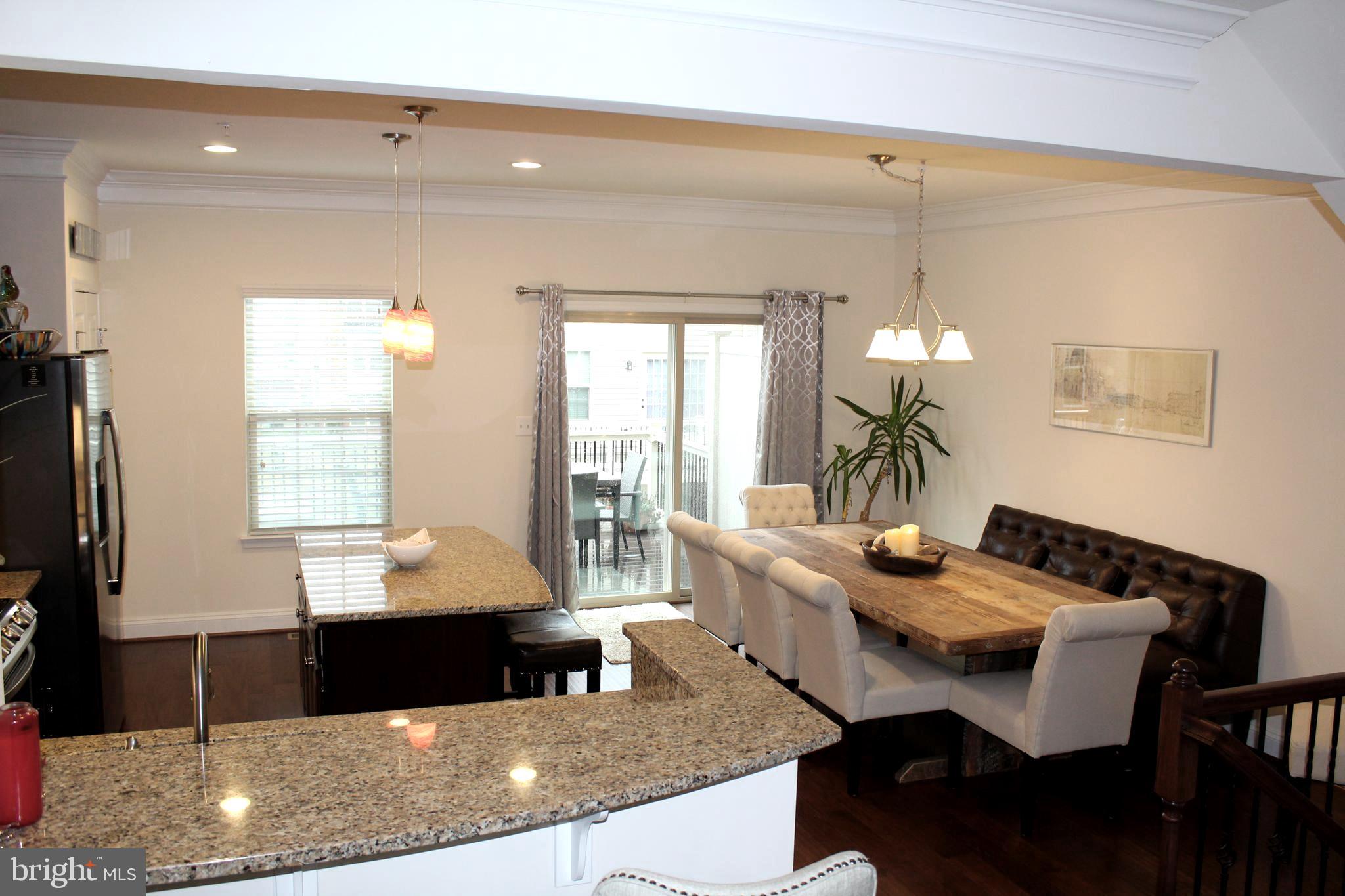 823 South Macon Street Baltimore, MD 21224 - Photo 8 of 30 Breakfast bar & island in kitchen