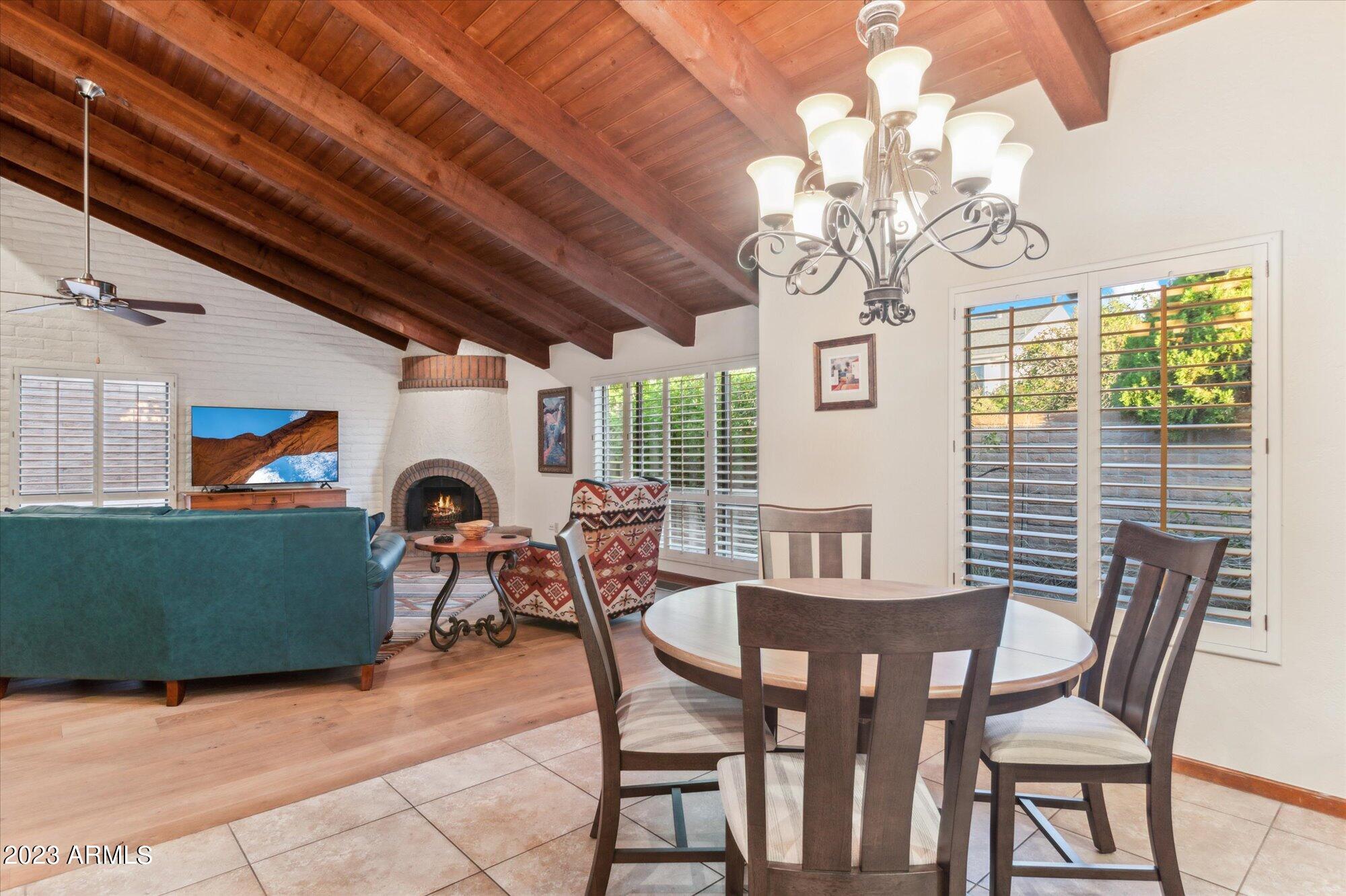 31 West Royal Palm Road Phoenix, AZ 85021 - Photo 4 of 24 a view of a dining room with furniture window and outside view
