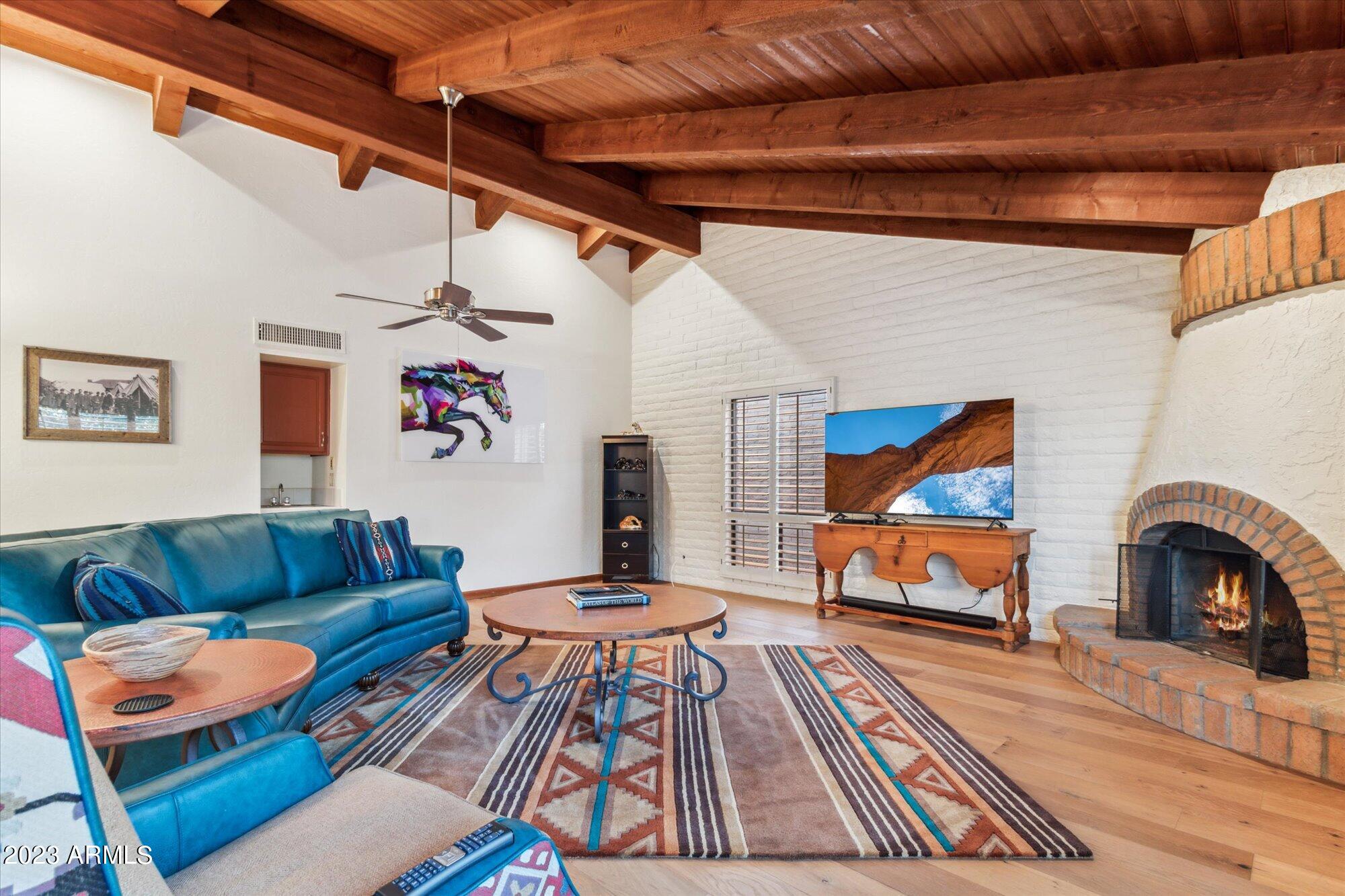31 West Royal Palm Road Phoenix, AZ 85021 - Photo 7 of 24 a living room with furniture and a wooden floor