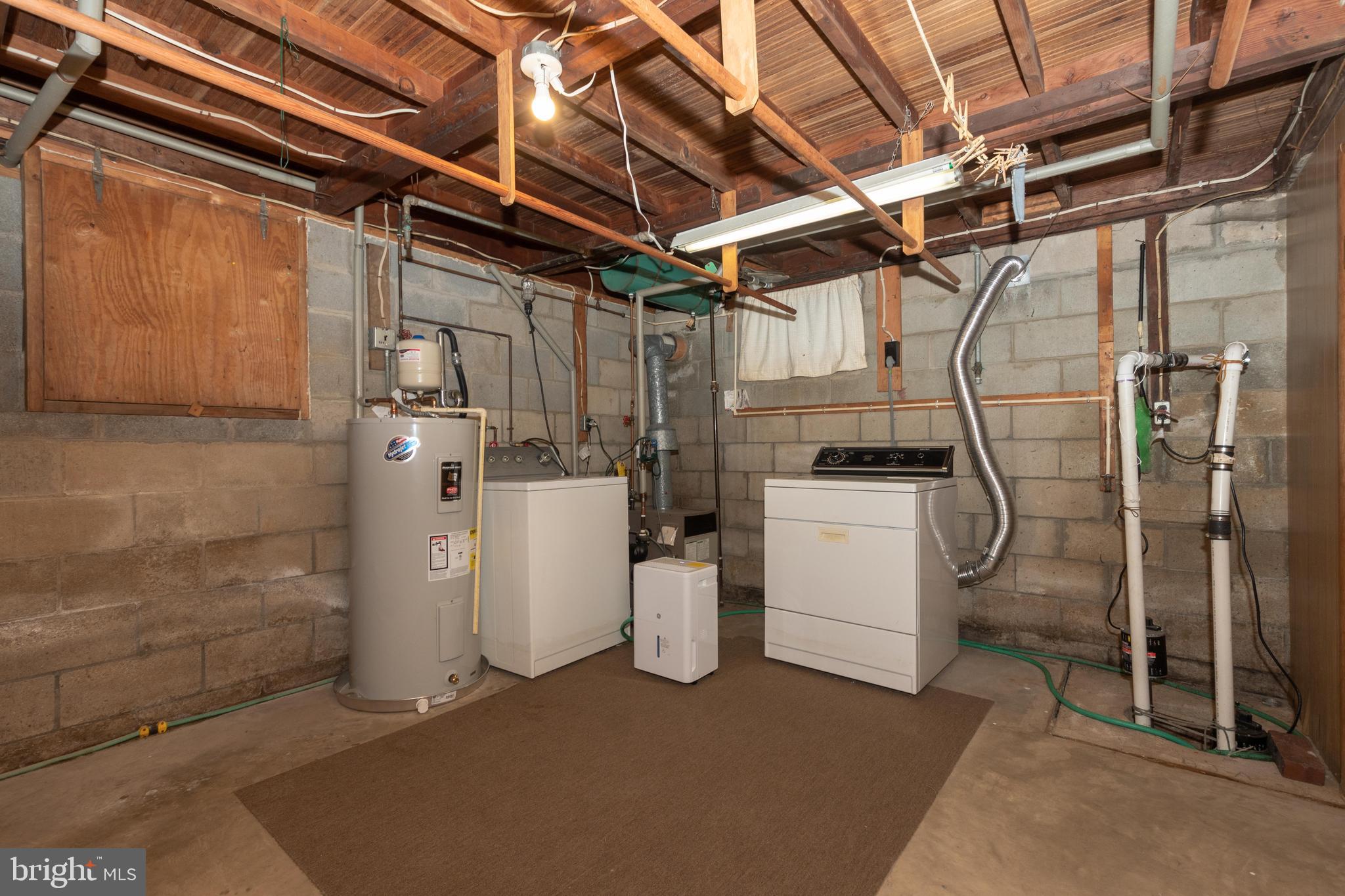 23 Honeycomb Road Baltimore, MD 21220 - Photo 32 of 42 Laundry area w/newer hot water heater