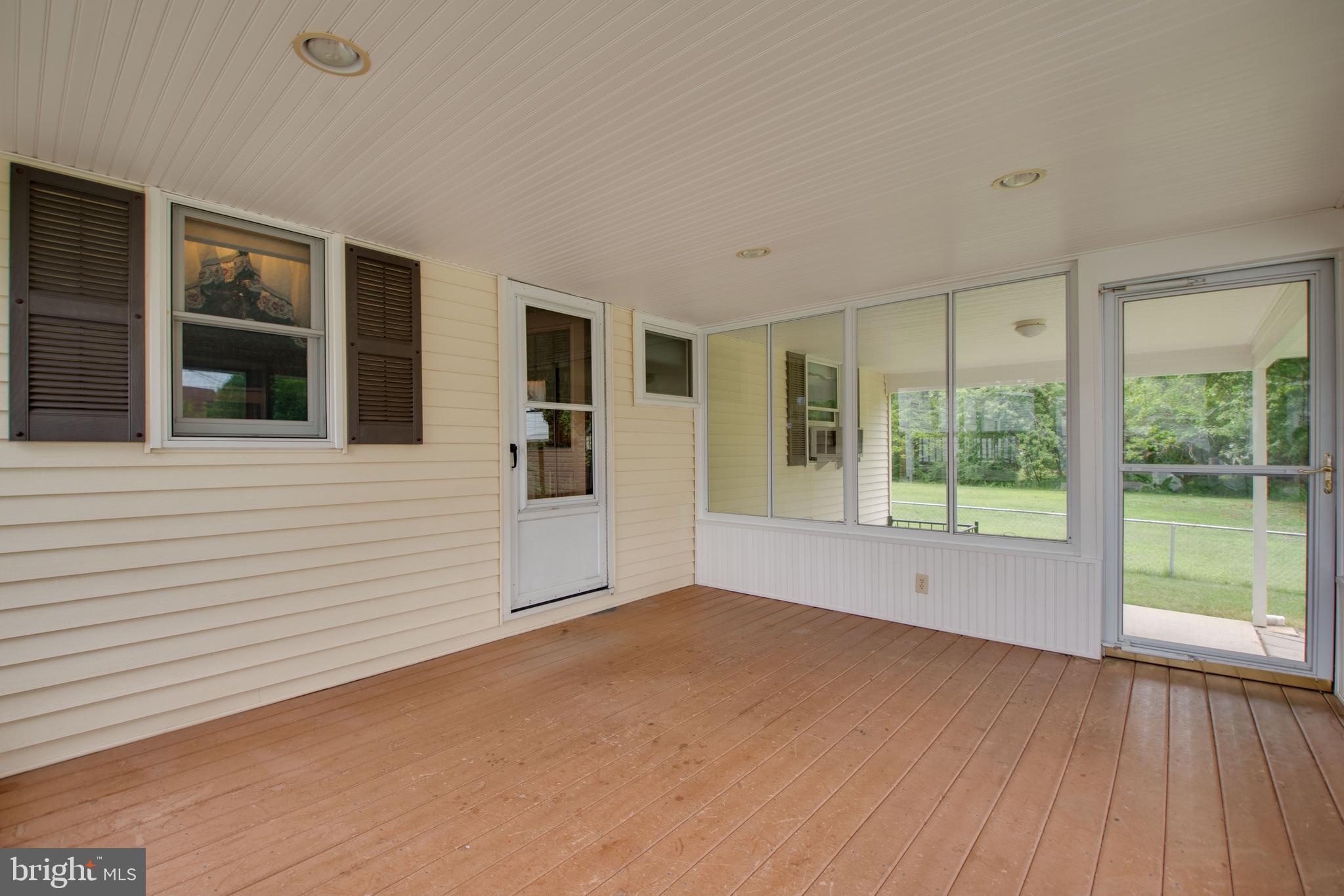 23 Honeycomb Road Baltimore, MD 21220 - Photo 42 of 42 Kitchen opens to sunroom