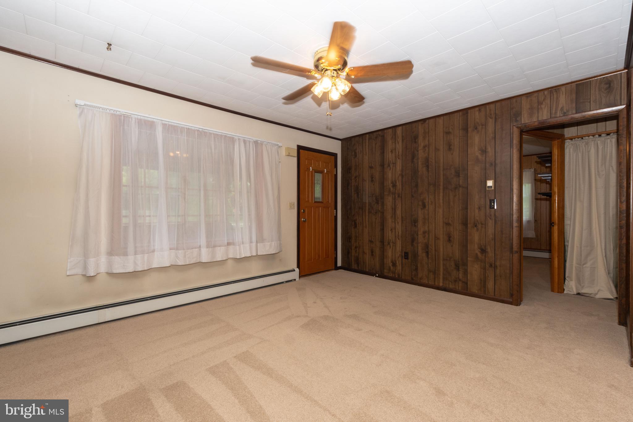 23 Honeycomb Road Baltimore, MD 21220 - Photo 7 of 42 Spacious living room with 2 ceiling fans