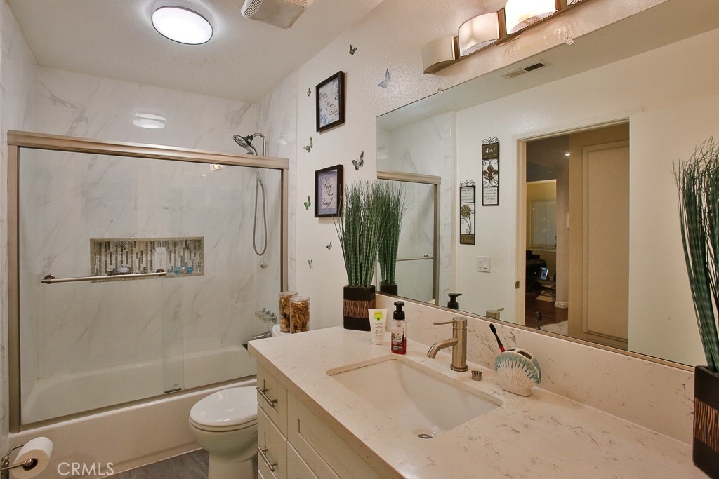 6637 Caro Street Paramount, CA 90723 - Photo 41 of 61 a bathroom with a sink toilet and shower