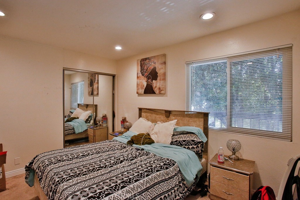 6637 Caro Street Paramount, CA 90723 - Photo 49 of 61 a bedroom with a large bed and a window
