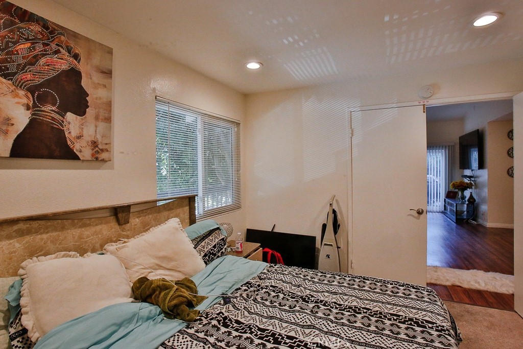 6637 Caro Street Paramount, CA 90723 - Photo 51 of 61 a bed room with a bed and a window