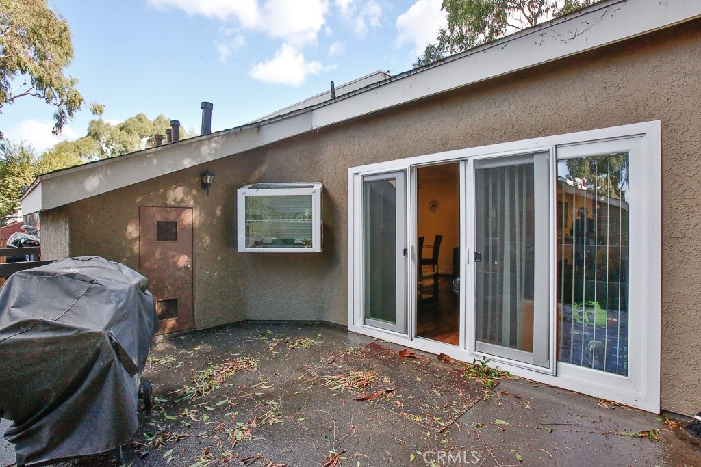 6637 Caro Street Paramount, CA 90723 - Photo 54 of 61 a backyard of a house with seating space