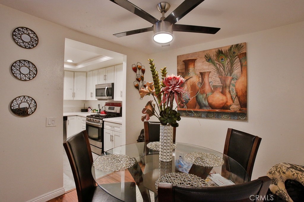 6637 Caro Street Paramount, CA 90723 - Photo 9 of 61 a living room with furniture and a table