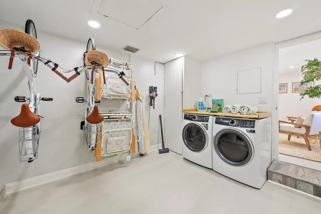 a utility room with dryer and washer