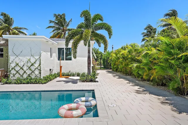 a backyard of a house with lots of green space