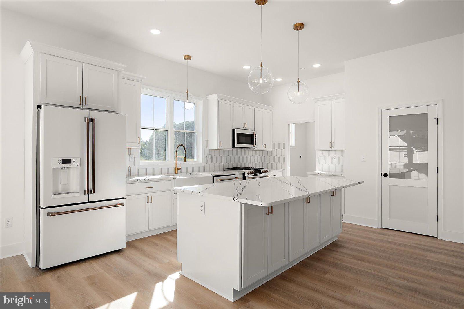 75 King Richard Road Berlin, MD 21811 - Photo 19 of 107 Modern kitchen with breakfast bar