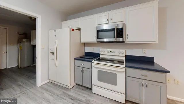 a view of a deck with a large trees