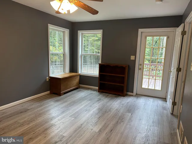 a backyard of a house with lots of green space