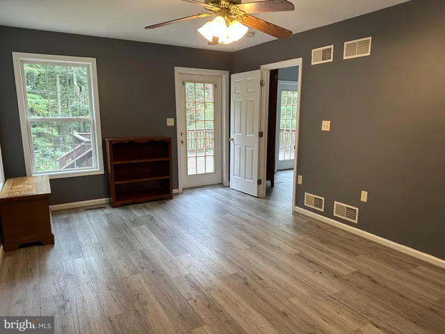 a view of house with yard