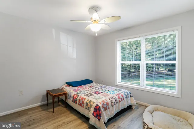 an aerial view of residential house and green space