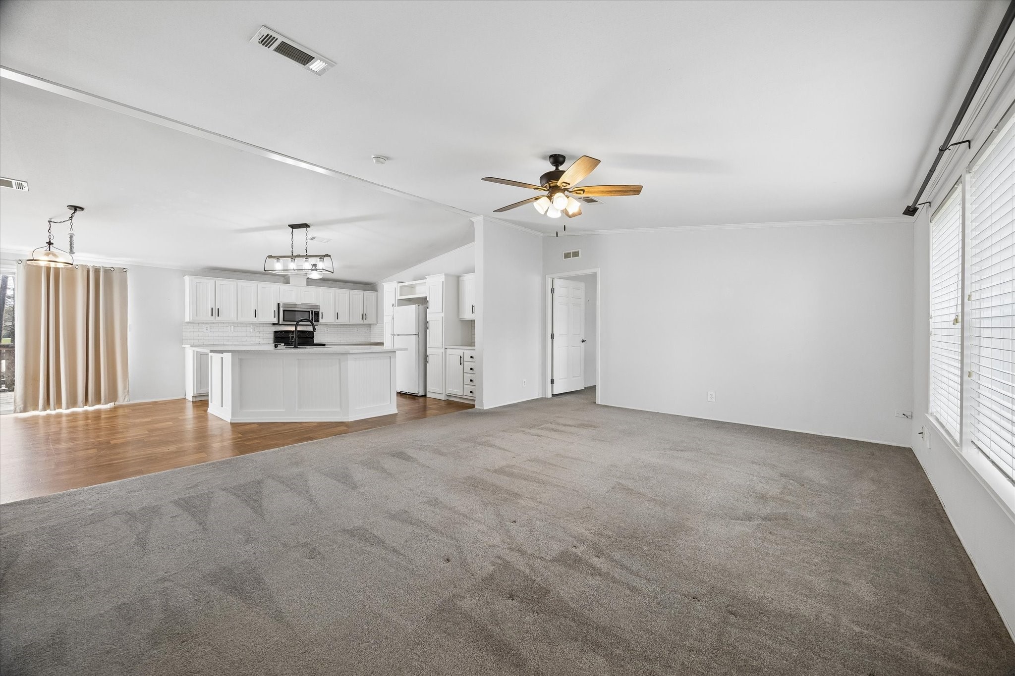 25361 Bluff View Court Magnolia, TX 77355 - Photo 2 of 10 a view of a kitchen with a sink and a window