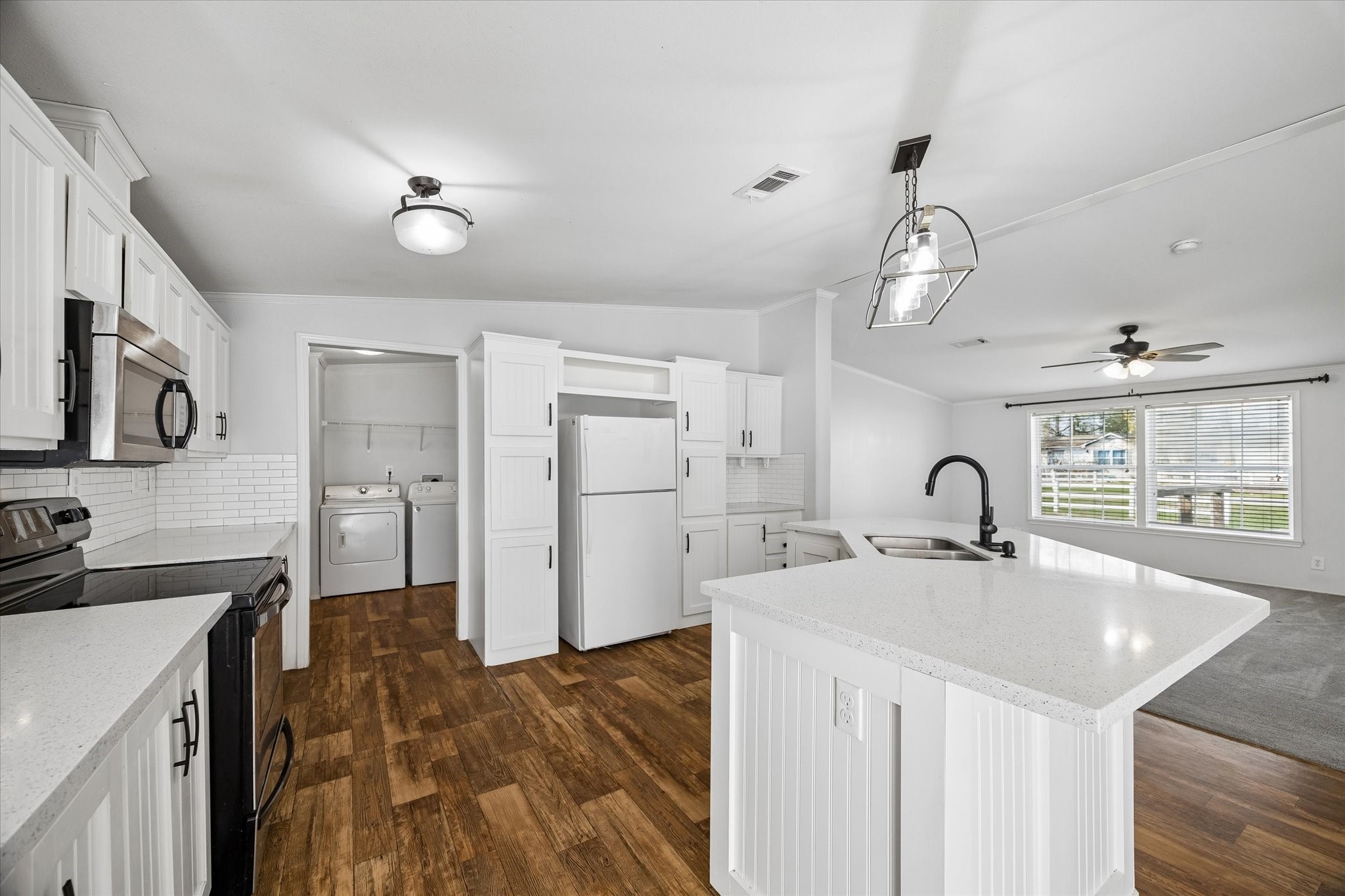 25361 Bluff View Court Magnolia, TX 77355 - Photo 4 of 10 a kitchen with a sink appliances cabinets and furniture