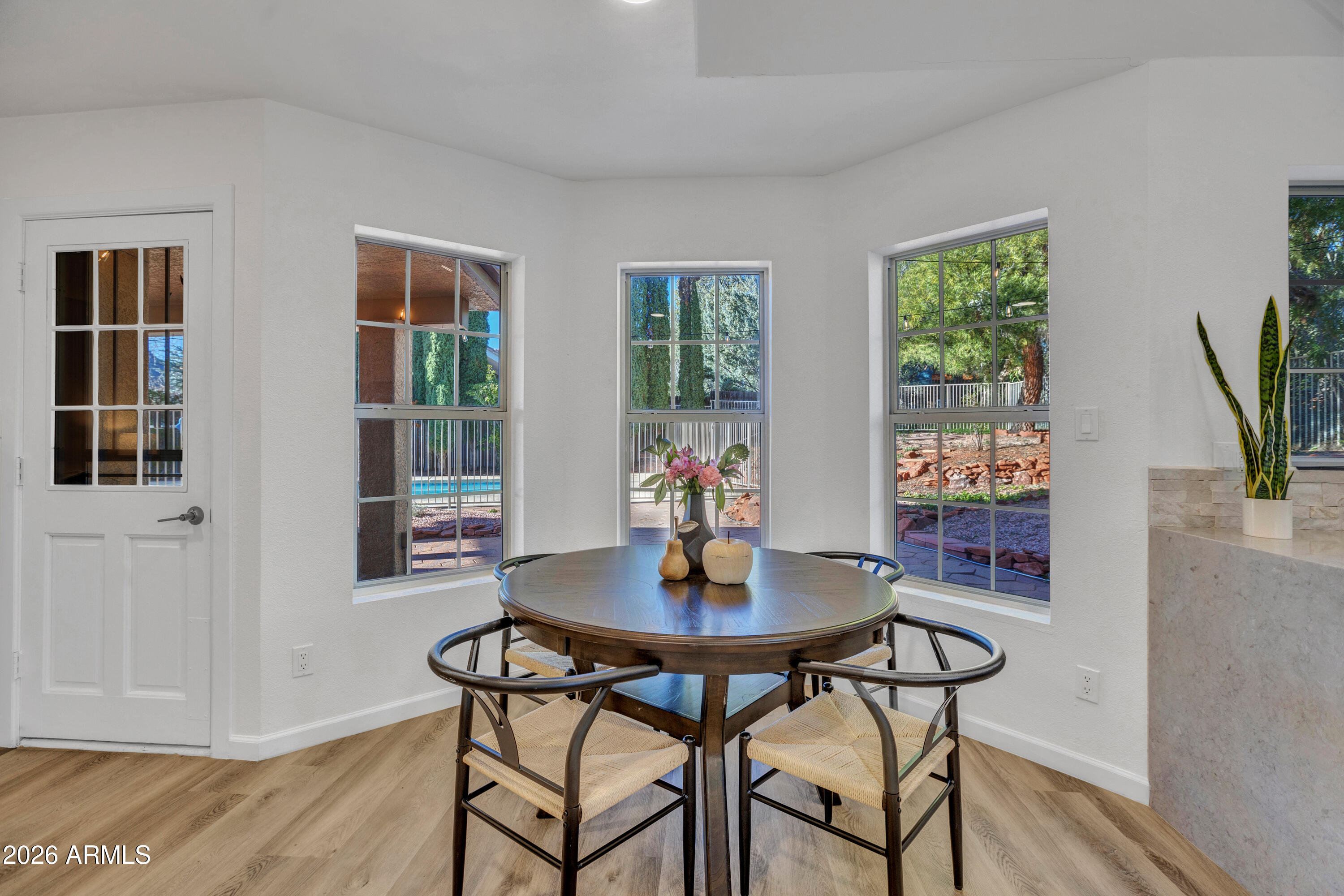 115 Stone Way Sedona, AZ 86351 - Photo 13 of 61 a dining room with furniture and window
