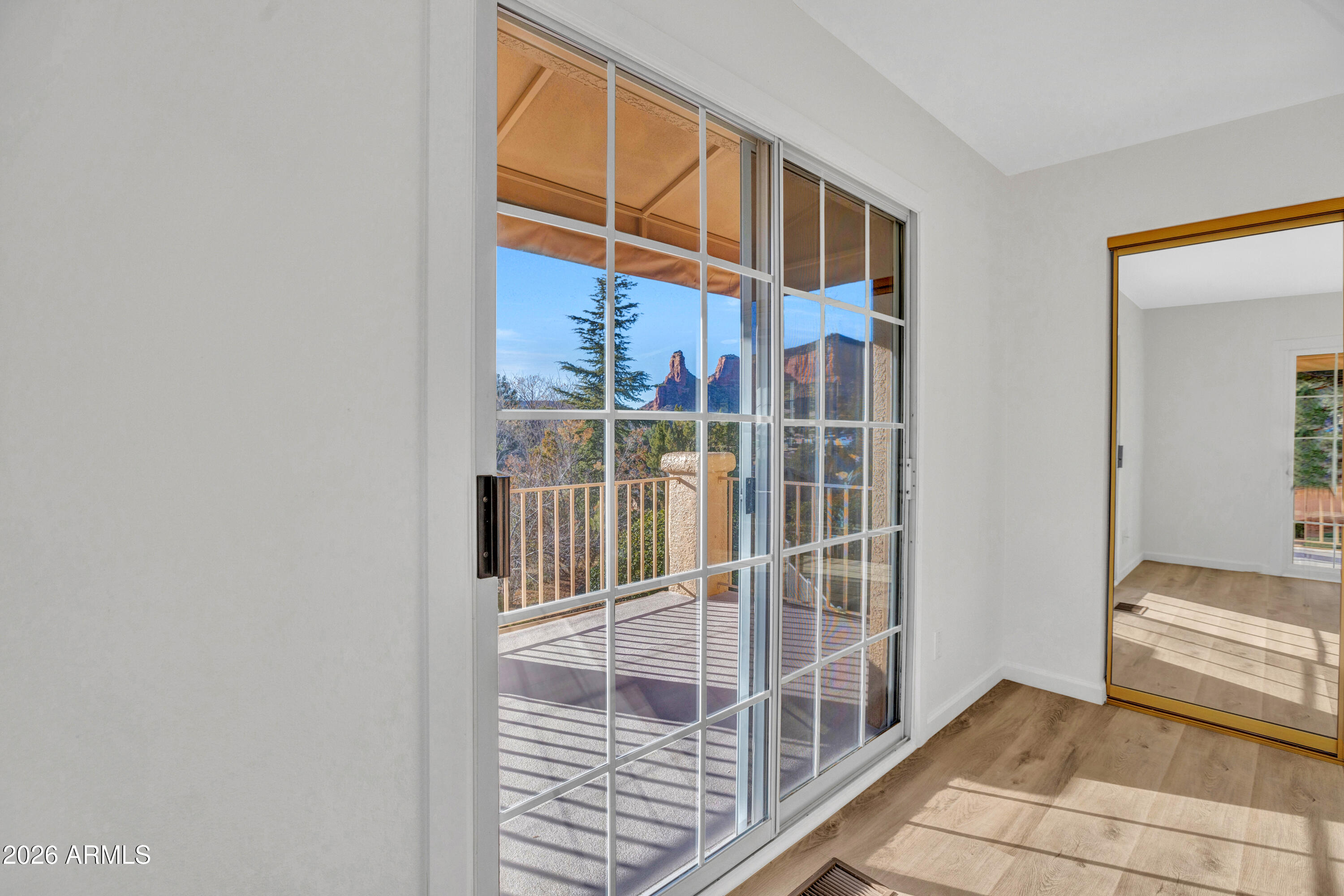 115 Stone Way Sedona, AZ 86351 - Photo 37 of 61 a view of staircase with white walls and windows