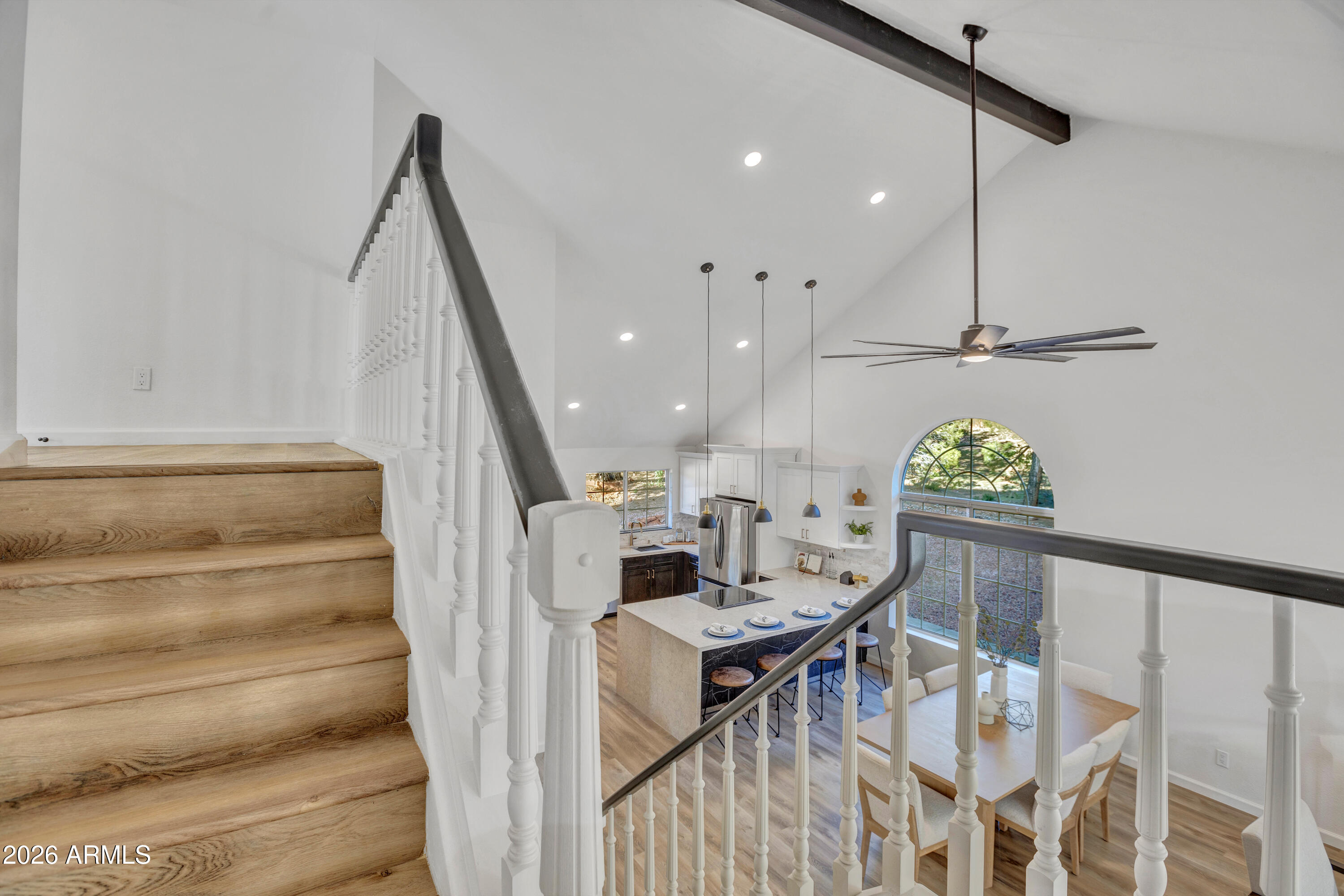 115 Stone Way Sedona, AZ 86351 - Photo 40 of 61 a view of a dining room with furniture and wooden floor
