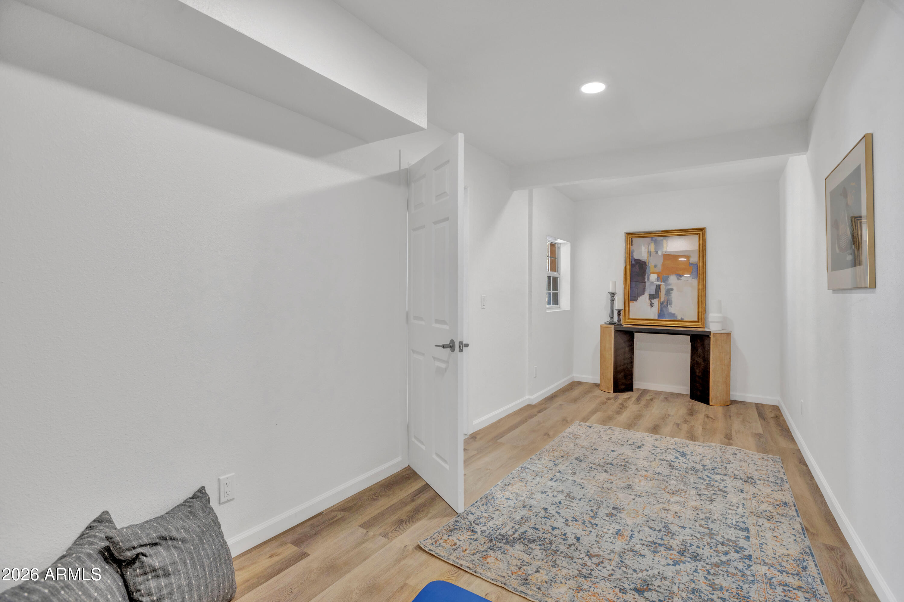 115 Stone Way Sedona, AZ 86351 - Photo 41 of 61 a view of a hallway with wooden floor and cabinet