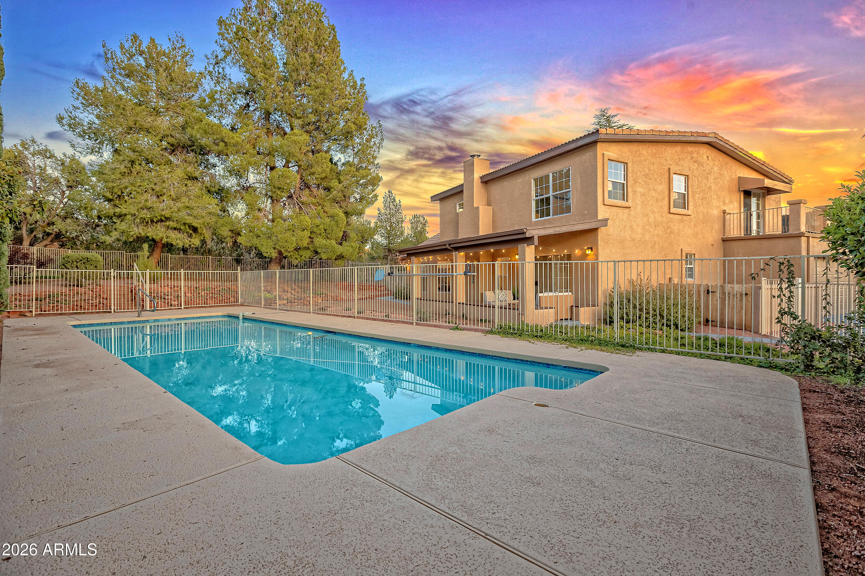 115 Stone Way Sedona, AZ 86351 - Photo 49 of 61 a view of a swimming pool with a backyard