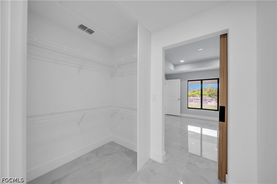 4028 26th Street Southwest Lehigh Acres, FL 33976 - Photo 23 of 38 a view of an empty room with window