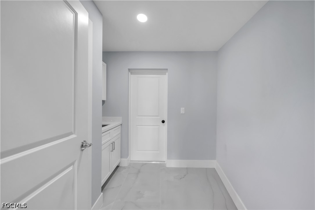 4028 26th Street Southwest Lehigh Acres, FL 33976 - Photo 36 of 38 a view of an empty room