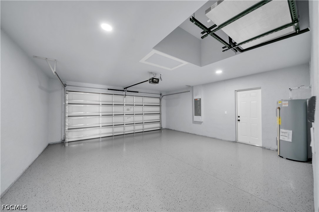 4028 26th Street Southwest Lehigh Acres, FL 33976 - Photo 37 of 38 a view of a livingroom with an empty space and a ceiling fan