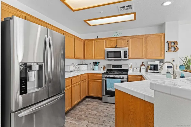 $680,000 | 405 Whispering Willow Drive, Unit E, Santee, CA 92071