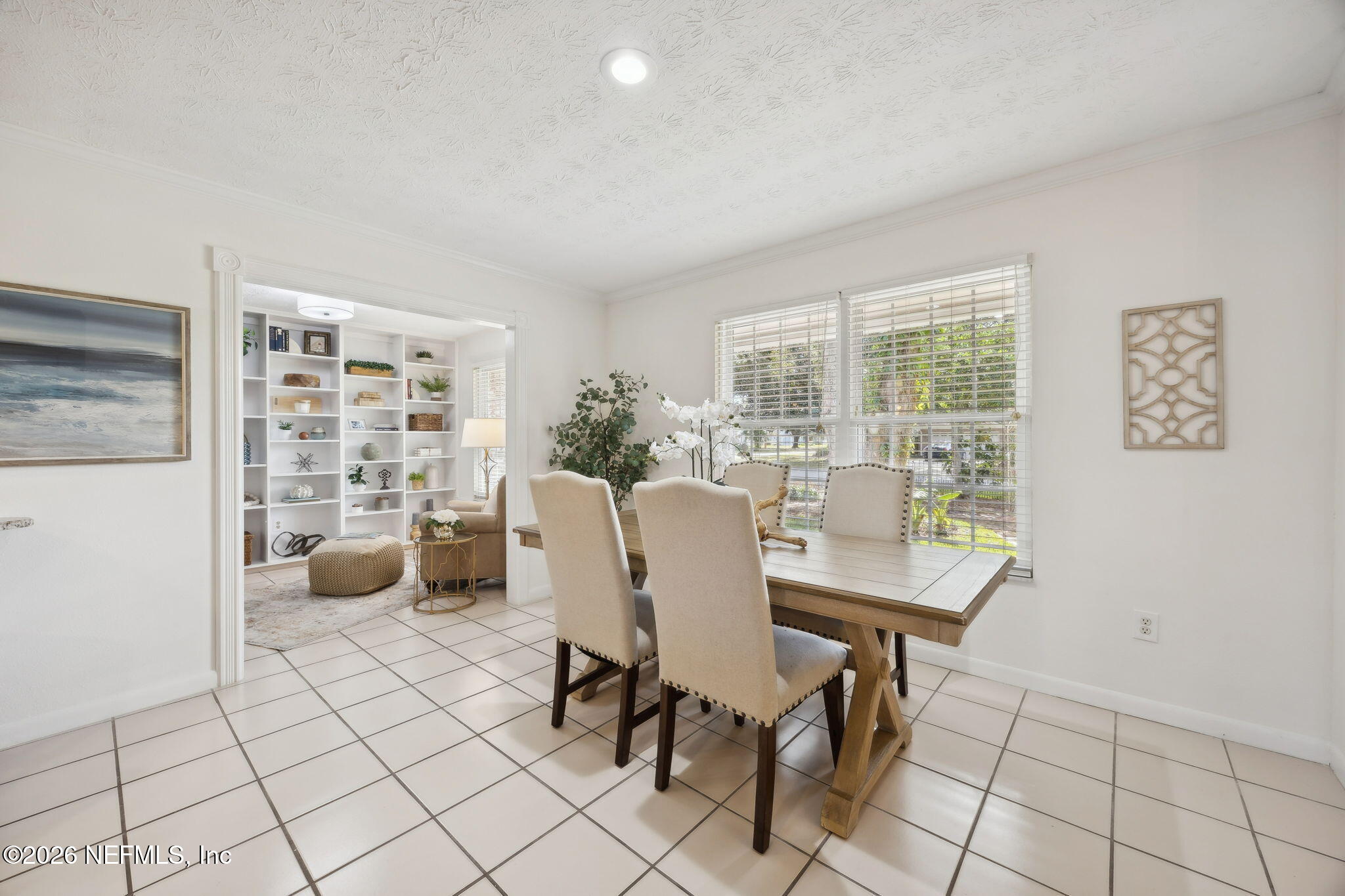 600 Davis Street Neptune Beach, FL 32266 - Photo 11 of 33 a dining room with furniture and window