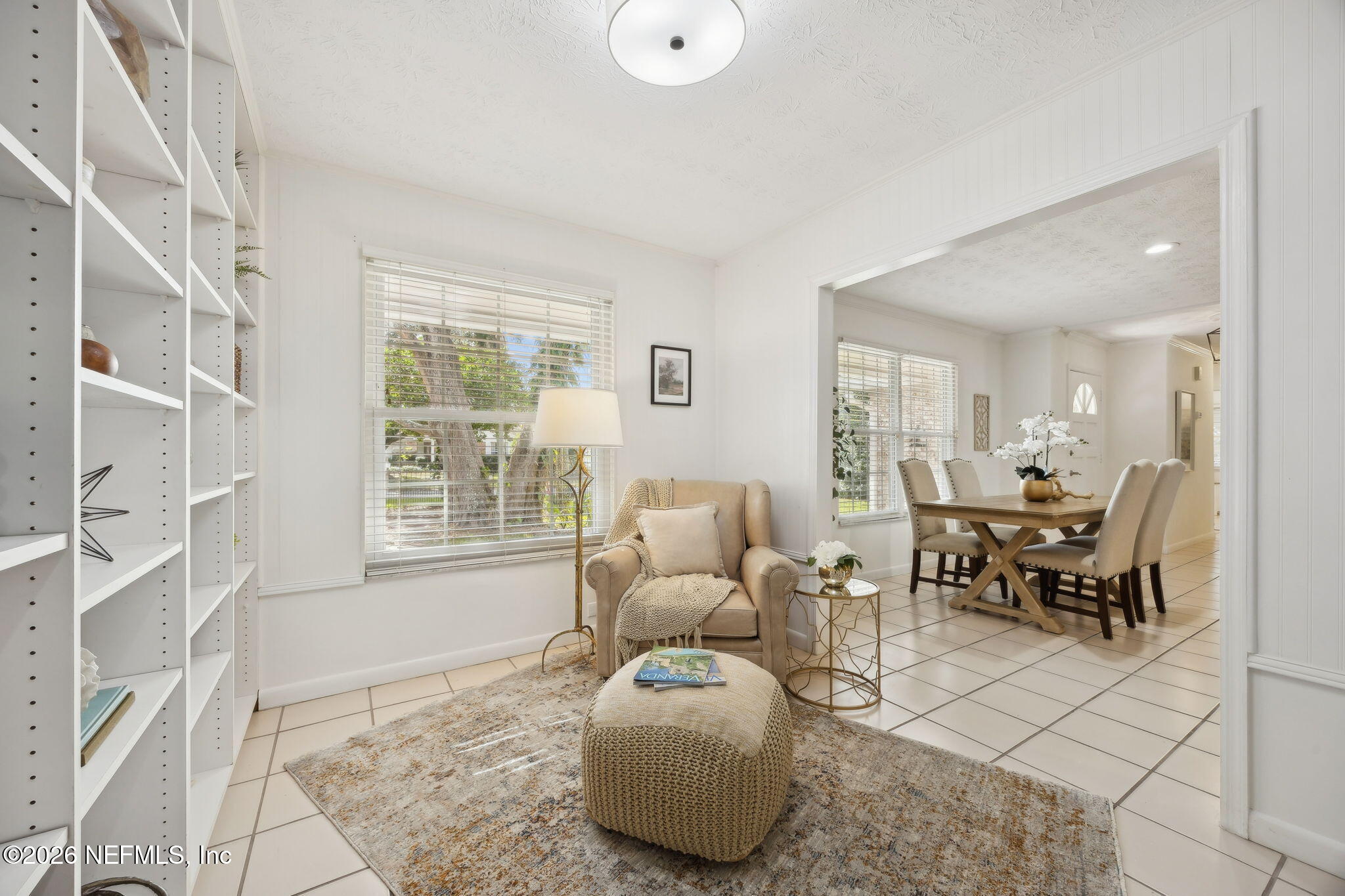 600 Davis Street Neptune Beach, FL 32266 - Photo 12 of 33 a living room with furniture and a large window