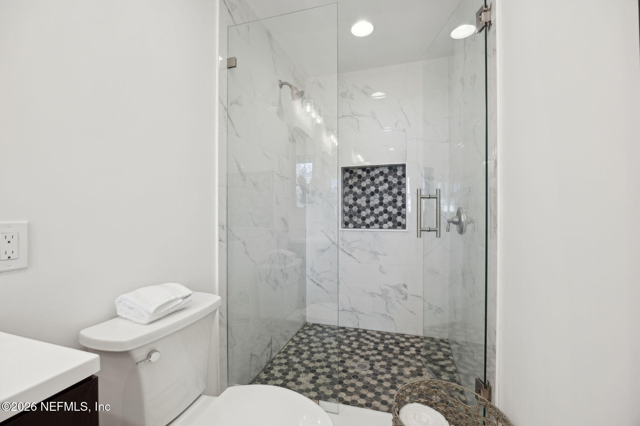 600 Davis Street Neptune Beach, FL 32266 - Photo 16 of 33 a bathroom with a toilet and a shower